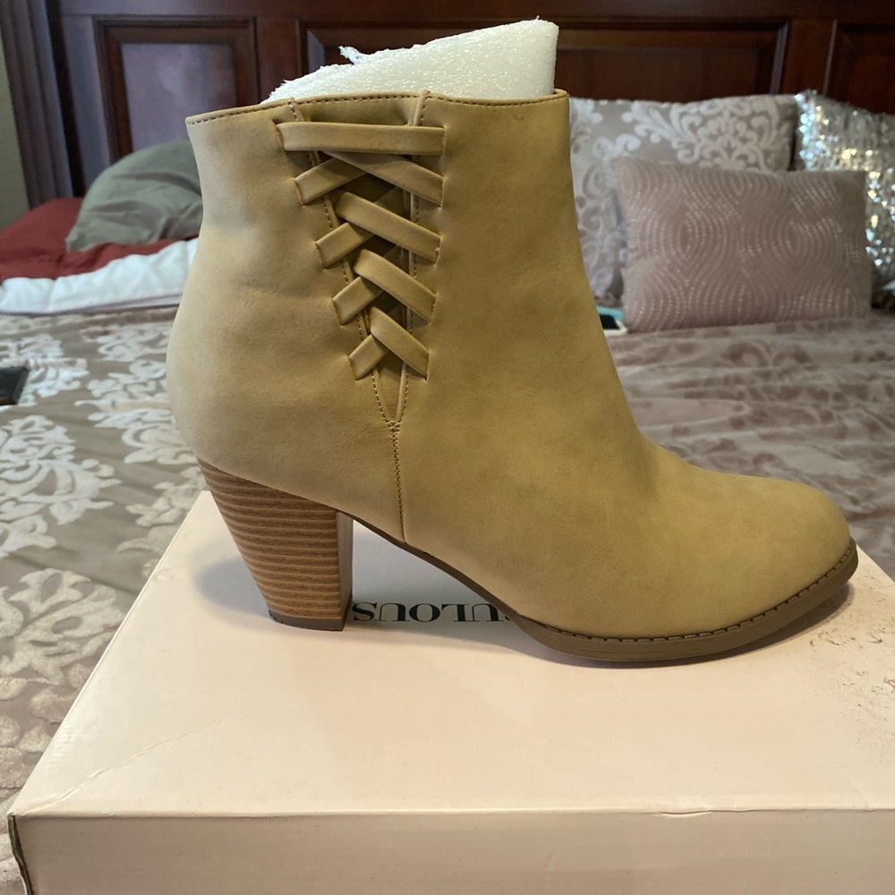 Booties from just fab, brand new never worn .. size 9.5